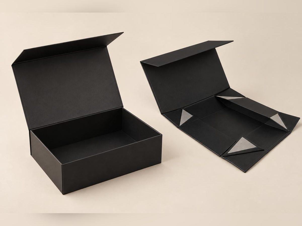 Black collapsible rigid box folded flat beside the erected box