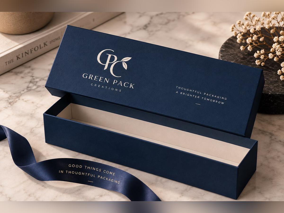 Long navy lid and base rigid box with a satin ribbon